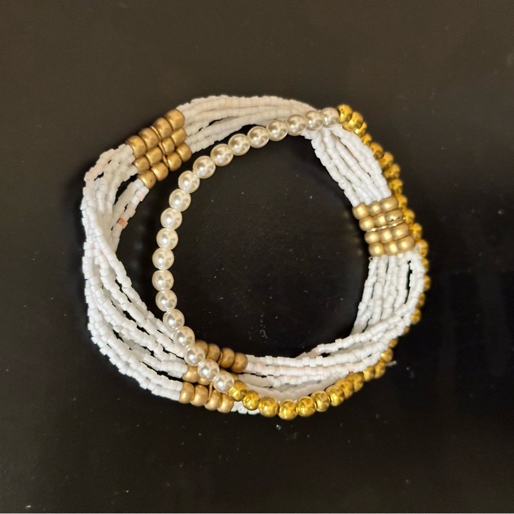 White and Gold Bracelets